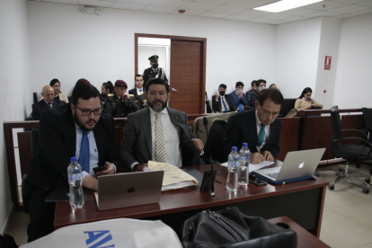 Diligencia. Abogados durante la audiencia en el Complejo Judicial.