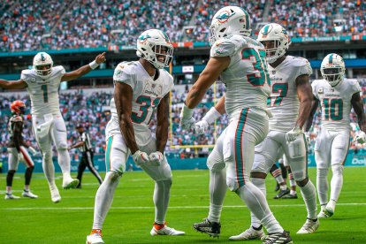 Miami Dolphins Raheem Mostert (31) celebrates with his teammate fullback Alec Ingold (30), after Ingold scored a touchdown on a pass from Miami Dolphins quarterback Tua Tagovailoa (1), left, against the Cleveland Browns during NFL action Sunday November 13, 2022 at Hard Rock Stadium in Miami Gardens.

Photos Cleveland Browns V Miami Dolphins 64