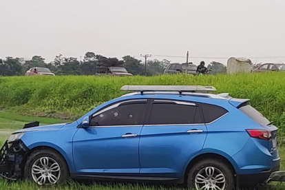 Escena. En el vehículo del fiscal son visibles los impactos de bala.