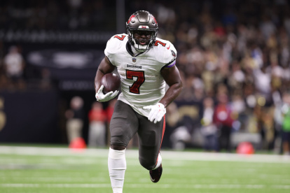 NEW ORLEANS, LA - September 18: Leonard Fournette #7 of the Tampa Bay Buccaneers runs upfield against the New Orleans Saints during a game at Ceasars Superdome on September 18, 2022 in New Orleans, Louisiana. (Photo by Perry Knotts/Getty Images)