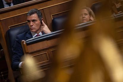El presidente del Gobierno en funciones Pedro Sánchez durante el primer día del debate de investidura celebrado este miércoles en el Congreso de los Diputados, en Madrid.