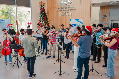 Grupo. Integrantes de la Orquesta Juvenil en Solca.