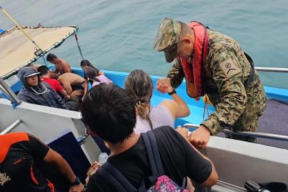 Tras el rescate, el servicio de seguridad coordinó la atención de los nueve ocupantes.