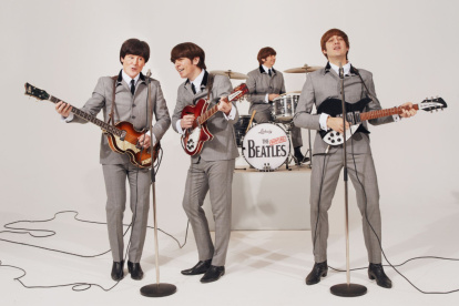 Los Beatles en acción.
