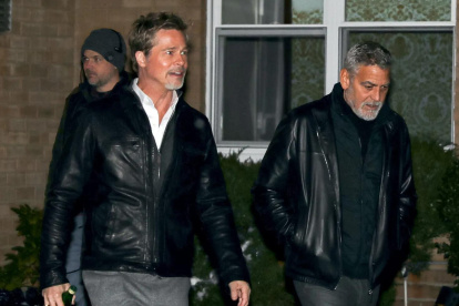 Los actores George Clooney y Brad Pitt.