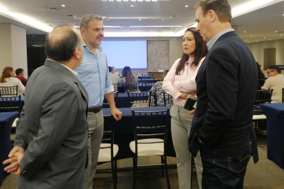 Empresario. André Obiol, empresario hotelero (izq.), en cita por el turismo.