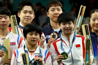 La delegación de China terminó segunda en el medallero por encima de EEE.UU., aún así los hinchas deportivos los acosan a los deportistas.