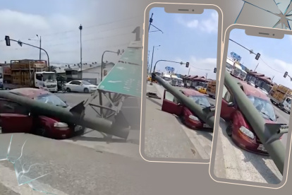 La estructura metálica que sostiene una señalética cayó sobre un carro en el kilómetro 11,5 de la vía a Daule, este viernes 6 de septiembre.