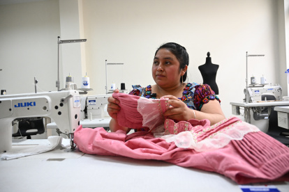 Marleny Tino-27- make a blouse at the Quédate Training Center in Joyabaj, Guatemala on March 19,2025. Guatemala implements a technical career training program to prevent the illegal migration of young people to the United States and to support those who are deported. In the indigenous municipality of Joyabaj the program is implemented by the International Organization for Migration (IOM) in a building built with funds from Japan. (Photo by JOHAN ORDONEZ / AFP) ag-periodistas
