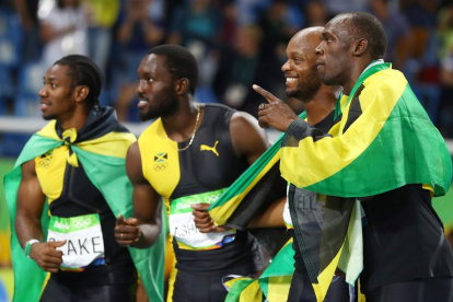 8 oros en tres Juegos Olímpicos diferentes, así como 14 medallas en campeonatos mundiales es el legado de Bolt (d).