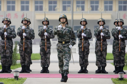 Soldados del Ejército de Liberación del Pueblo (PLA) en el centro de entrenamiento para la Tercera División de Guardia, ubicado en las afueras de Pekín (China).
