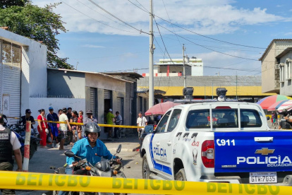 En el mercado del cantón La Libertad los sicarios asesinaron a una mujer embarazada