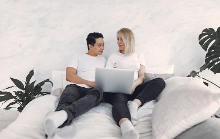 man-and-woman-sitting-on-a-bed-3912351