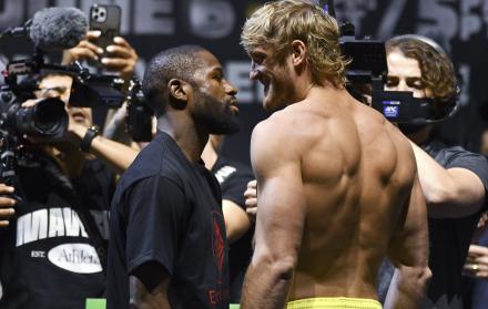 floyd-mayweather-logan-paul-weigh-in-faceoff-ap