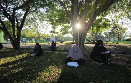 mujeres orando en Aceh