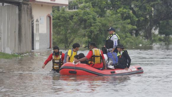 evacuación por inundaciones en Milagro