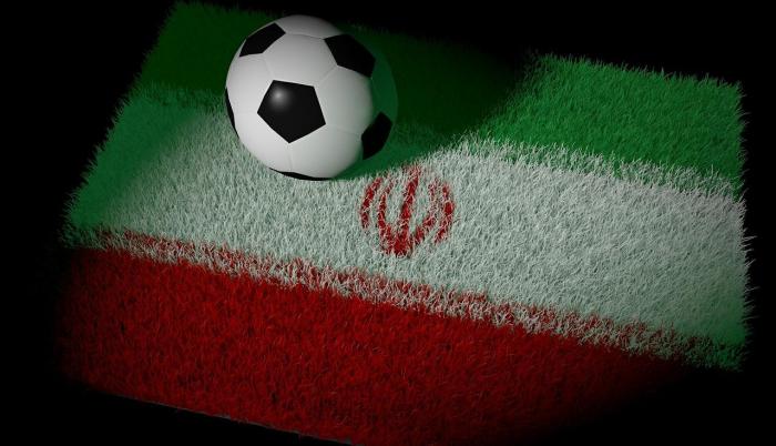 Bandera-de-Iran-con-un-balon-de-futbol