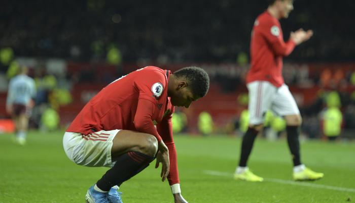 Manchester United Premier pérdidas