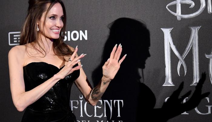 El lunes presentó en Italia su nueva película, Maléfica: dueña del mal, y al estreno asistió con sus hijos.