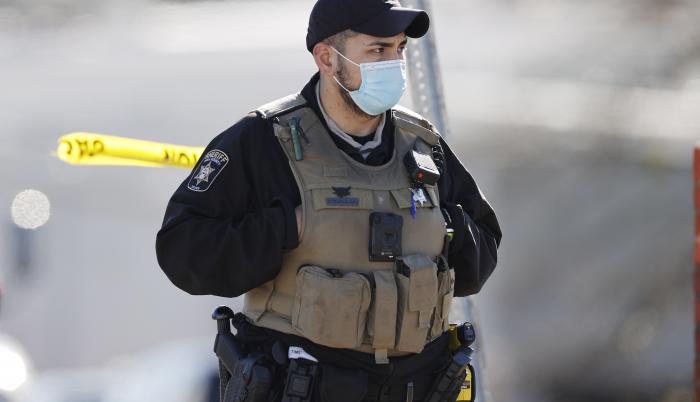 Police outside the Prime-Pak Foods Inc. food packing plant following a reported chemical leak which officials indicate has killed multiple workers and sent many more to the hospital in Gainesville, Georgia,