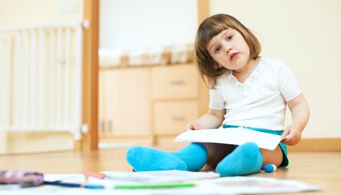 calm-child-sketching-on-paper