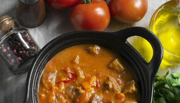 top-view-tasty-goulash-and-tomatoes