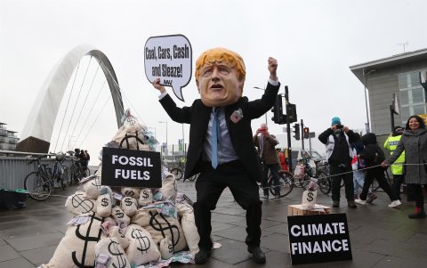Los manifestantes durante la Cumbre del Clima de la ONU COP26 en Glasgow, Gran Bretaña, el 12 de noviembre de 2021.
