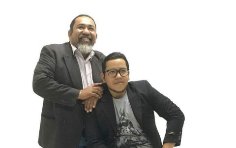 Con su padre, Héctor Garzón.