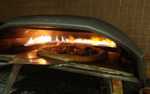 Opción. Hasta morcilla llevan las pizzas.