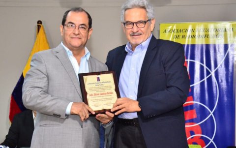 Édison con Mario Canessa.