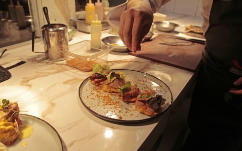 Coconut tapa shrimp chicken and saussage