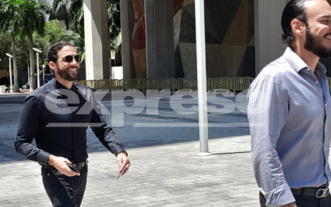 Mauricio Neme (Izquierda) y un acompañante en la audiencia.