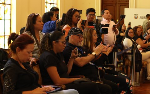 Migrantes venezolanos durante la reunión.