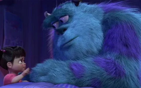 Sullivan junto a Boo en 'Monsters Inc.'