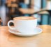 hot caramel macchiato in coffee shop
