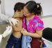 Los tres niños que recibieron por primera vez el tratamiento para la acondroplasia en Ecuador.
