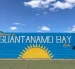 Fotografía del 22 de marzo de 2026 de un mural que da la bienvenida en un letrero en inglés a la bahía de Guantánamo, en Guantánamo (Cuba).