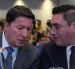 El registrador Hernán Penagos (i) y el presidente del Consejo Nacional Electoral (CNE), Cristian Quiroz, hablan durante la instalación de la Misión de Observación Internacional.