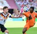 Yan Diomandé encara a Joshua Kimmich durante el partido entre Costa de Marfil y Alemania.