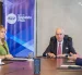 Representantes de la CFN y del Banco del Austro en la firma del convenio.