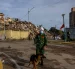 Rescatistas de Vietnam realizan labores de búsqueda de sobrevivientes a los terremotos, este 30 de junio de 2026 en Catia La mar, La Guaira (Venezuela)