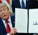 El presidente de los Estados Unidos, Donald J. Trump, firma una orden ejecutiva relativa a terrenos en Utah en Washington, DC, EE. UU., el 13 de julio de 2026.