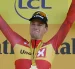 El ciclista noruego Soren Wærenskjold, del Uno-X Mobility, celebra en el podio tras ganar la etapa 11 del Tour de Francia.