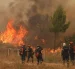 Los bomberos combaten un incendio forestal en la zona metropolitana de Megara, Ática, Grecia, el 2 de agosto de 2026.