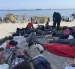 Numerosos inmigrantes permanecen en la playa del Trampolín que se ha transformado en un asentamiento desde la entrada masiva registrada el 30 de julio en la ciudad española de Ceuta.