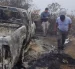 En la zona donde fueron hallados los cuerpos también habían camionetas incineradas.