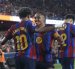 El delantero del FC Barcelona Lamine Yamal (i) celebra con Raphinha su gol, segundo gol del equipo blaugrana, en el partido ante Rayo Vallecano.