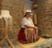 Una artesana que elabora sombreros de paja toquilla en Cuenca.