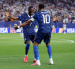 Kylian Mbappé y Ousmane Dembélé celebrando un gol en la selección de Francia.