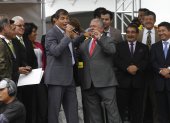 Rafael Correa y Luis Chiriboga en un homenaje de la Tri posterior al Mundial 2014.